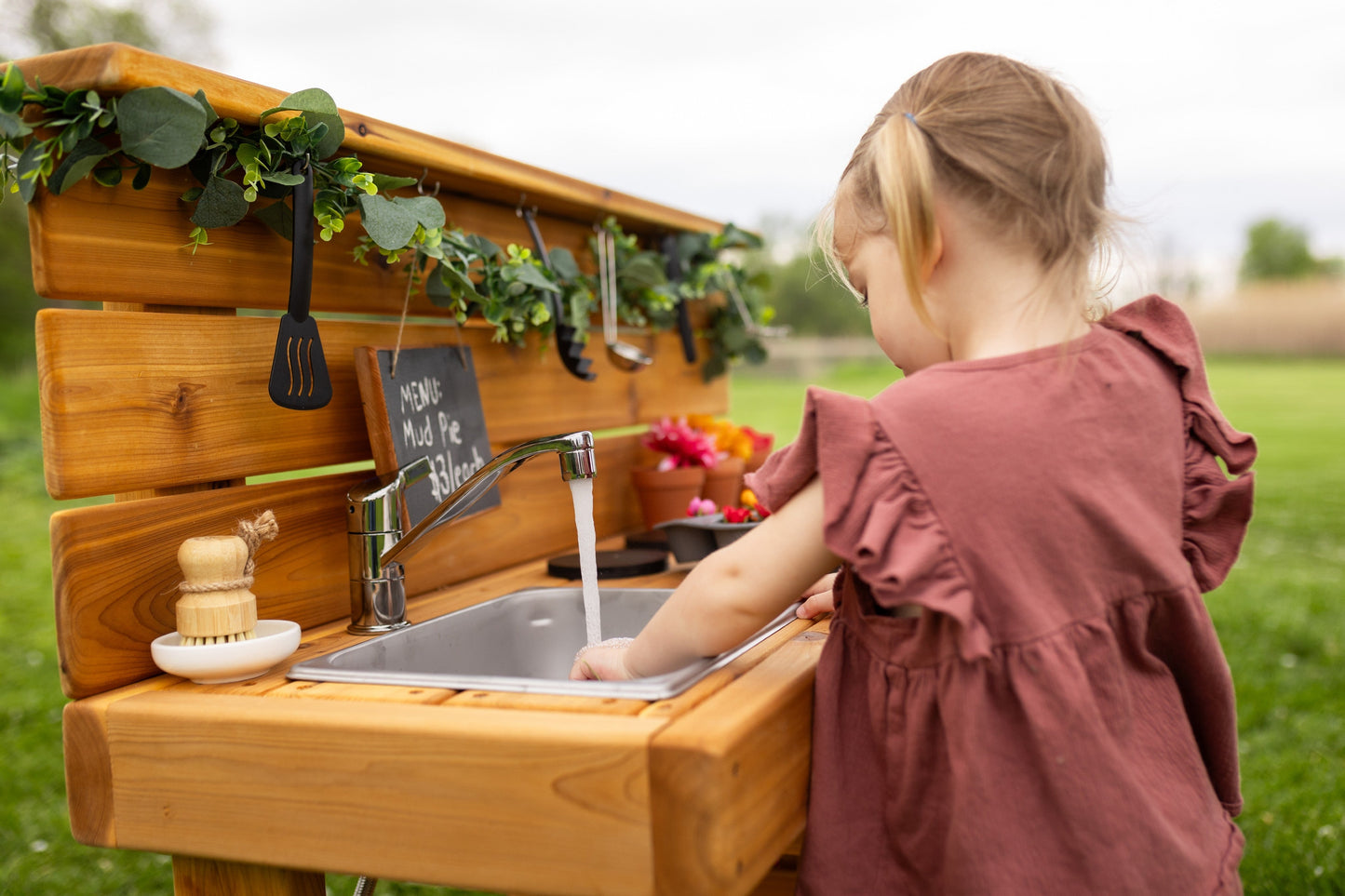 Centered Mud Kitchen with Oven and Working Sink