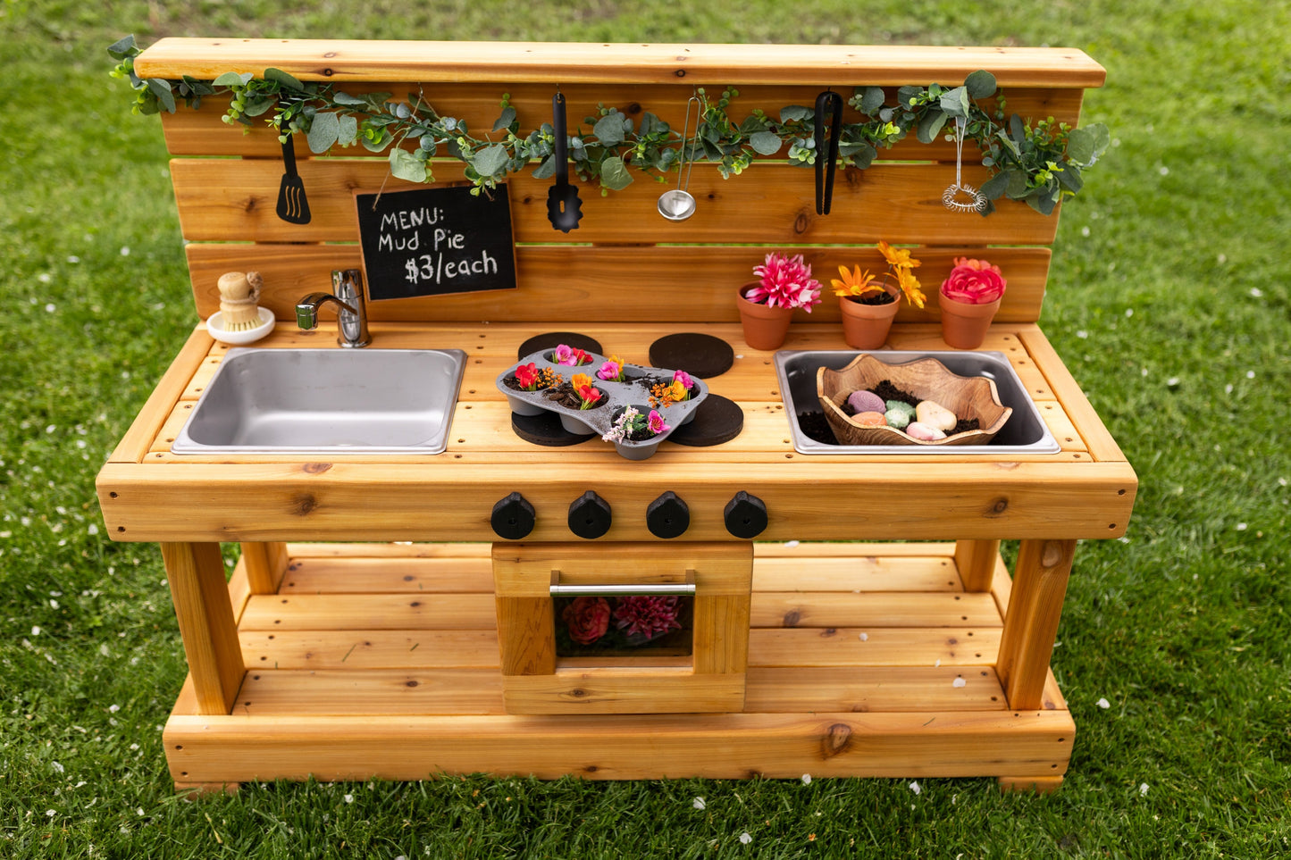 Centered Mud Kitchen with Oven and Working Sink