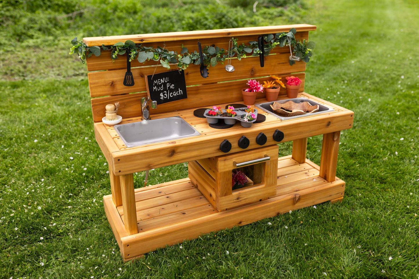 Centered Mud Kitchen with Oven and Working Sink